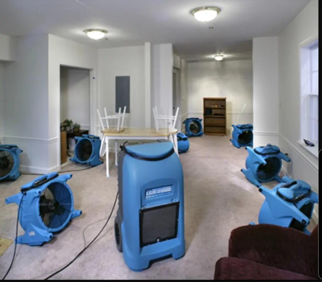 Air movers and dehumidifier setup for Water Damage Restoration in Carlsbad